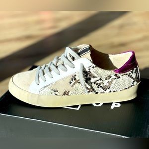 Brand new, never worn size 6.5 shushop paula sneaker.